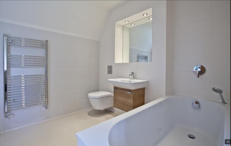 Salle de bain, Sanitaires & Plomberie par Liomatherm à Pétange, réalisation 4