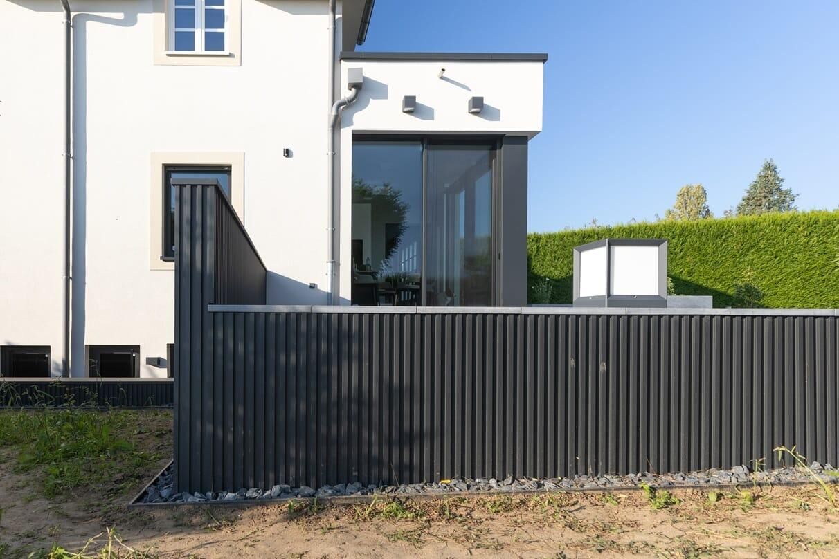 Metal Cladding & Large Window in Leudelange — photo 3